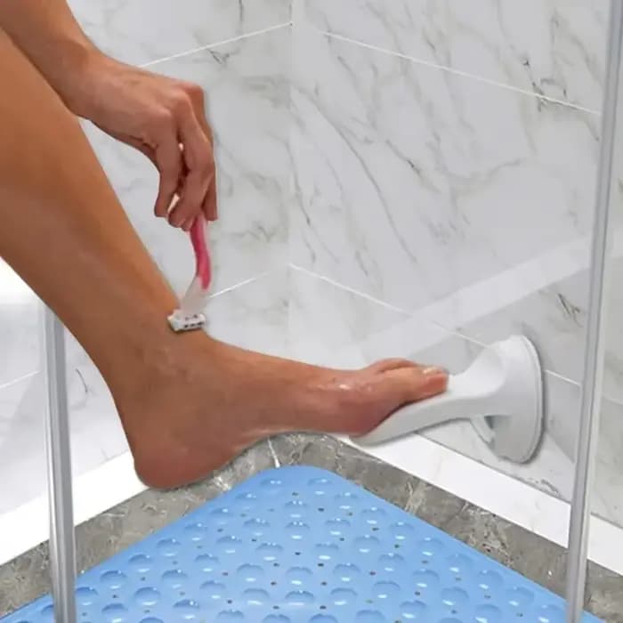 Repose-pieds de douche