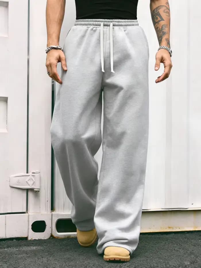 Pantalon cargo confortable pour homme, coupe droite, avec une taille ample et un cordon de serrage élastique – idéal pour les trajets quotidiens.
