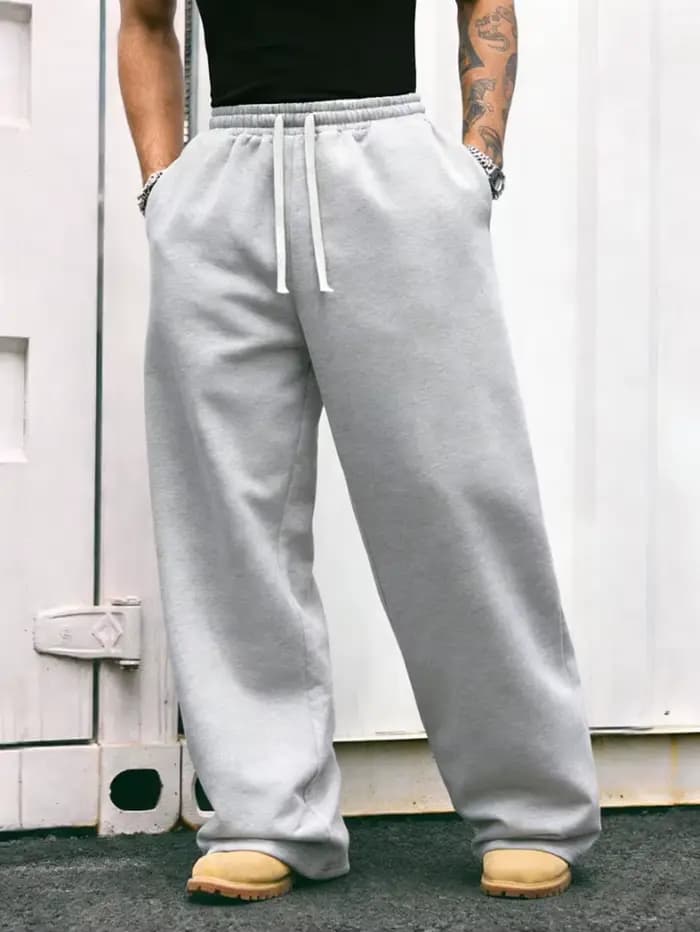 Pantalon cargo confortable pour homme, coupe droite, avec une taille ample et un cordon de serrage élastique – idéal pour les trajets quotidiens.