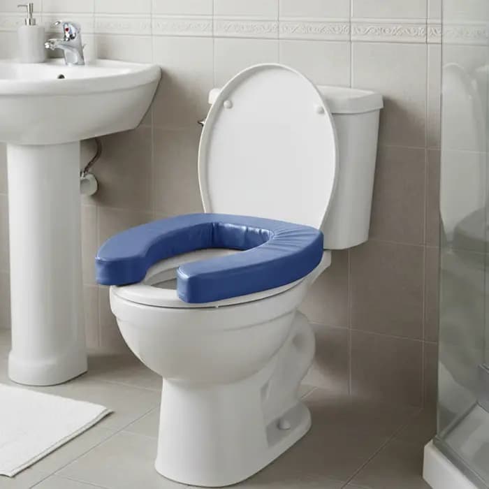 Rehausseur de siège de toilette portable et rembourré