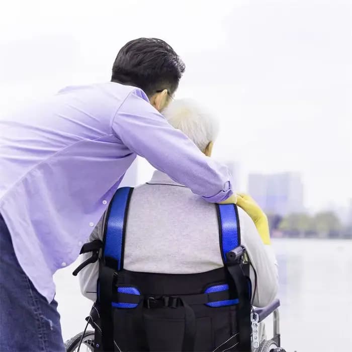 Ceinture de sécurité pour prévention des chutes de fauteuil roulant