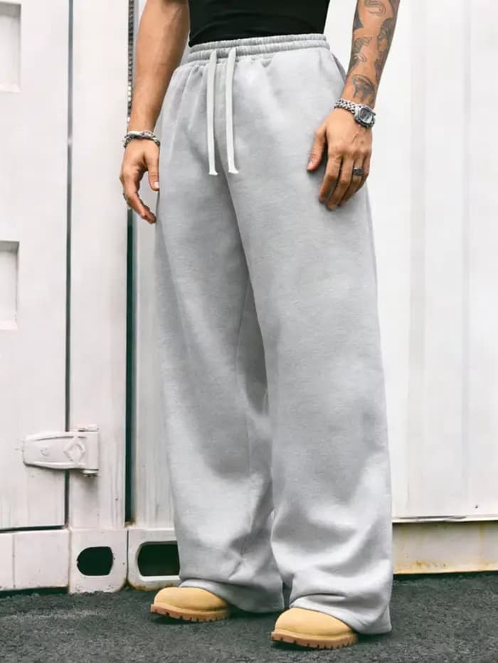 Pantalon cargo confortable pour homme, coupe droite, avec une taille ample et un cordon de serrage élastique – idéal pour les trajets quotidiens.