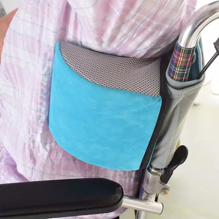 Coussin de position anti-latéral pour fauteuil roulant bloqué
