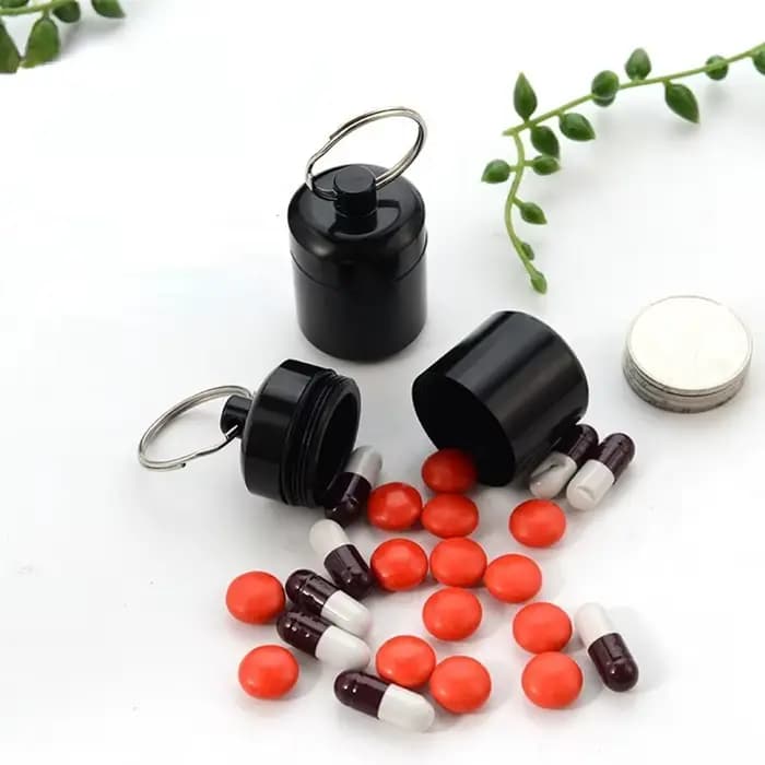 Boîte à pilules étanche en aluminium avec rangement scellé